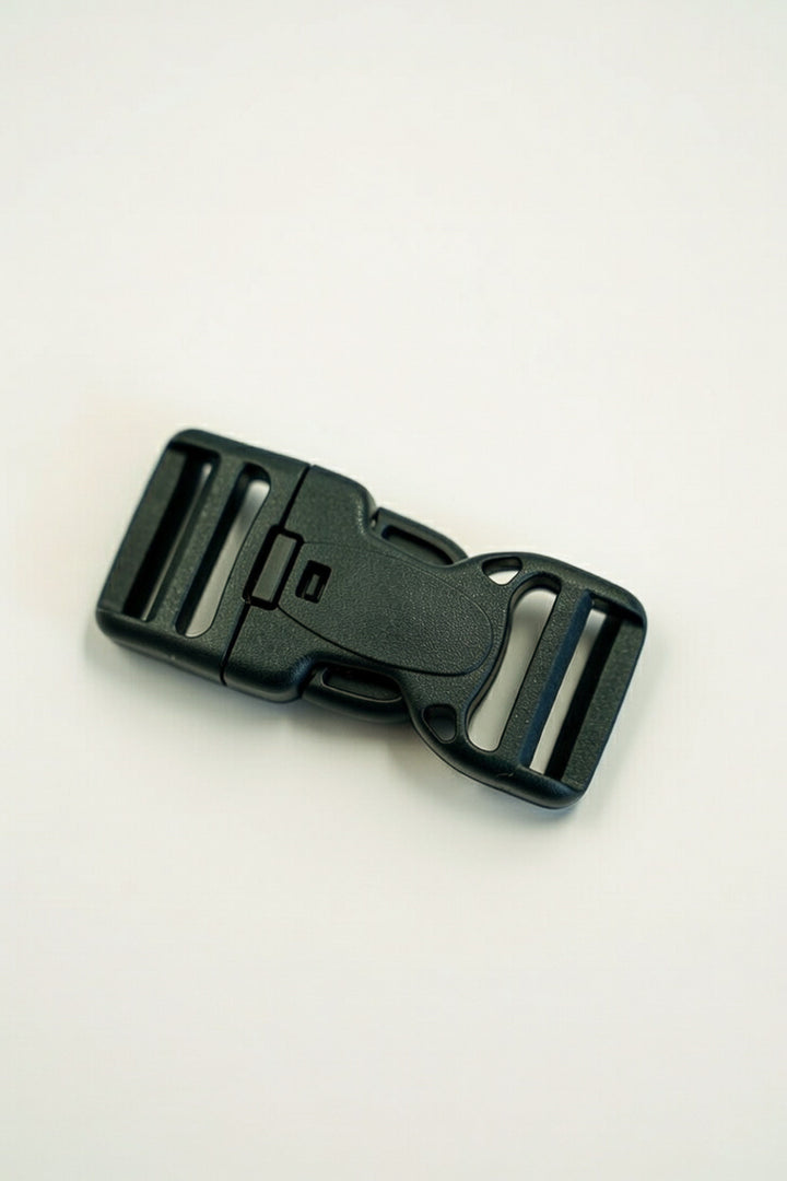 Hebilla con botón de seguridad 25mm negro