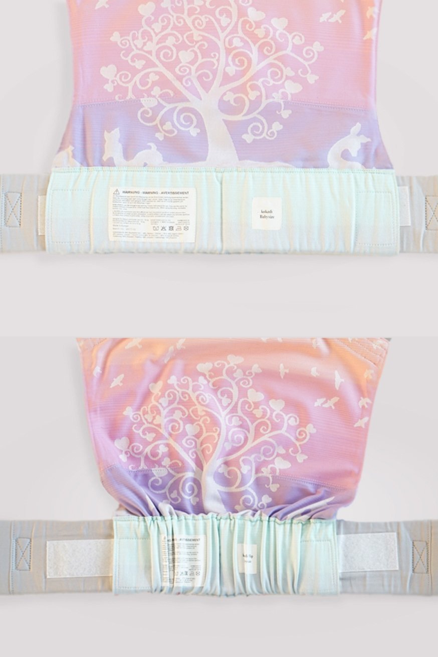 KOKADI Babytrage WrapStar Marie im Wunderland ❤ türkis SilverLine